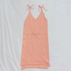 Small pink knit midi dress with shoulder ties